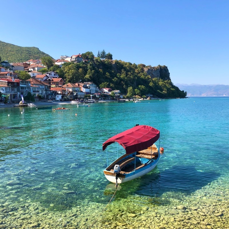 A Small Boat On A Crystal-Clear Lake Ohrid, North Macedonia, Balkan Peninsula, South Eastern Europe
