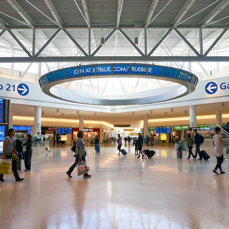 Passengers Walking Through Hall At New York JFK Airport, United States