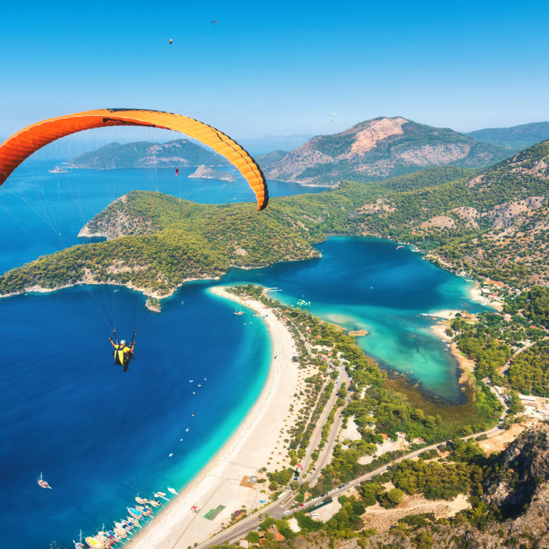 Ölüdeniz paraglider going towards the ocean