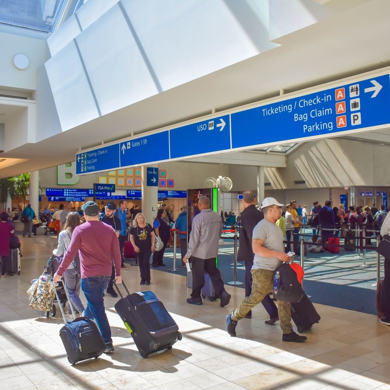 Passengers Transiting Orlando International Airport, Orlando, Florida, United States