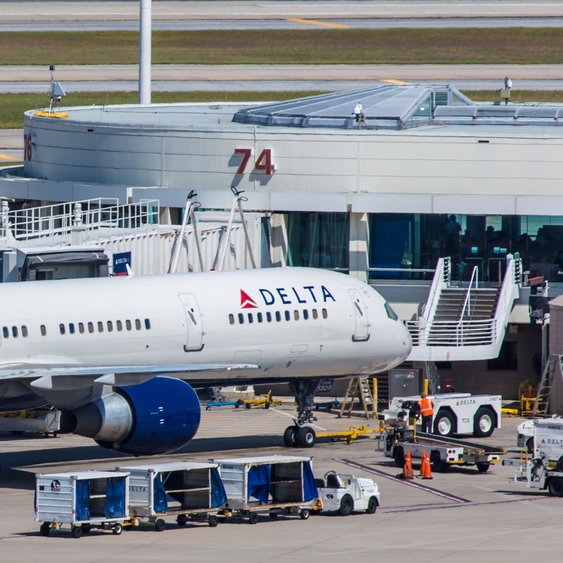 Delta Airlines Aircraft Parked By An Airport Gate, Orlando International Airport, Florida, United States