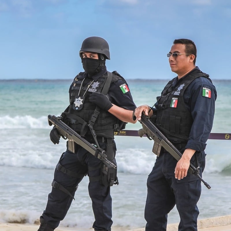 Mexican Police Officers Patrolling Playa Del Carmen, Quintana Roo, Mexico