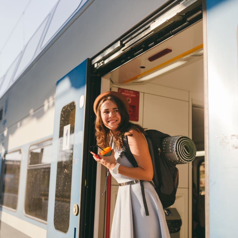 Woman boarding a European sleeper train