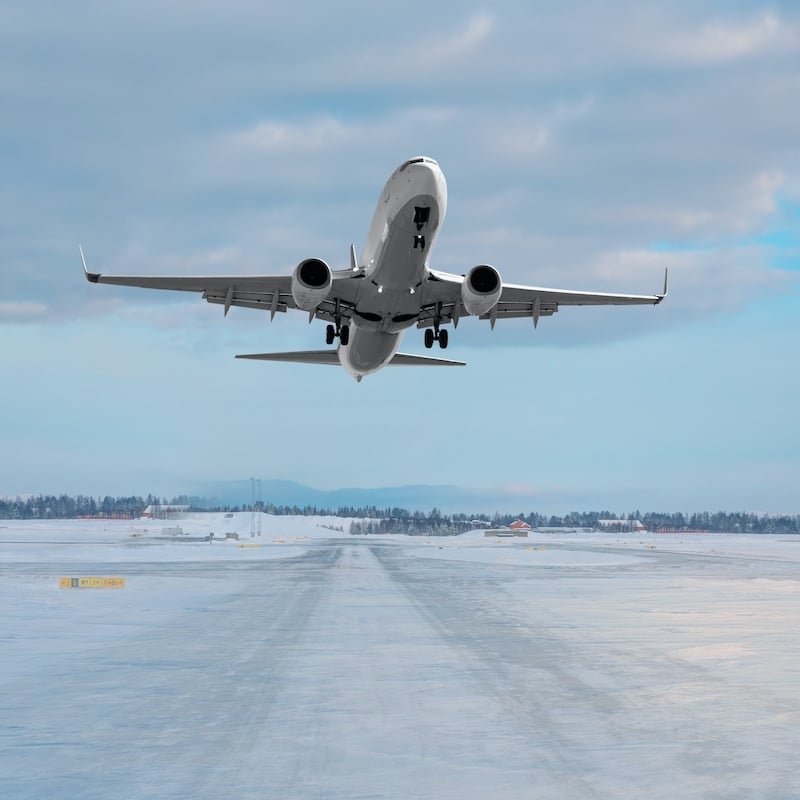 Airplane Taking Off From Snowy Runway, Unspecified Location